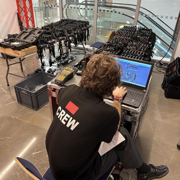 technician setting languages at full serviced hire event
